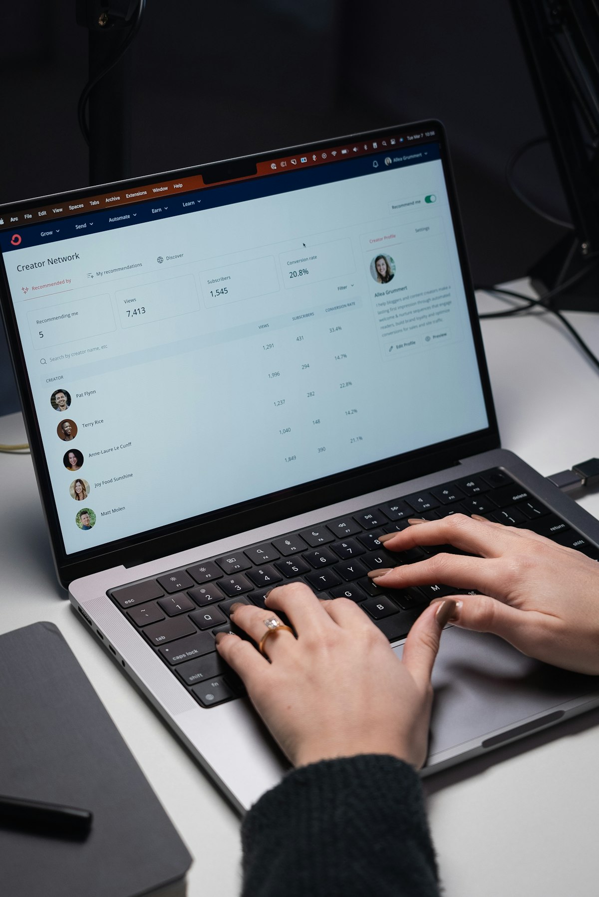 Workflow automation running on a laptop showing Zapier connections