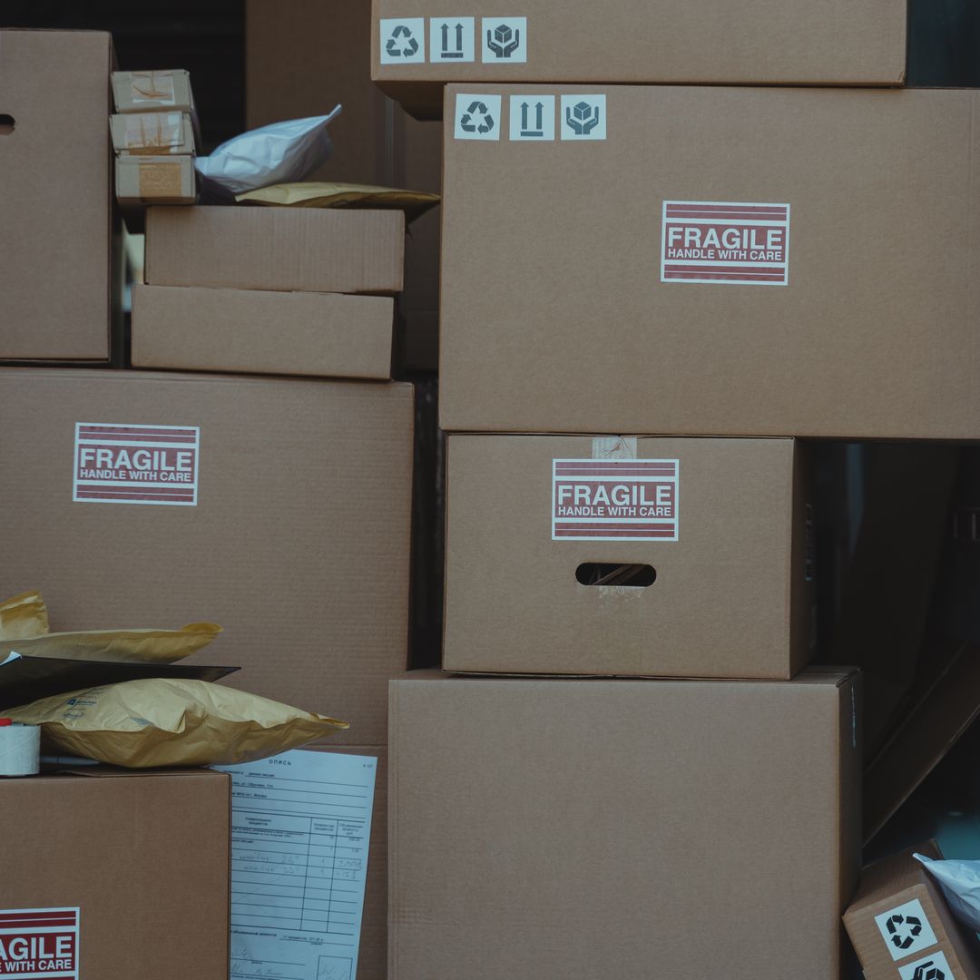 Stacked delivery parcels ready to ship from an e-commerce business