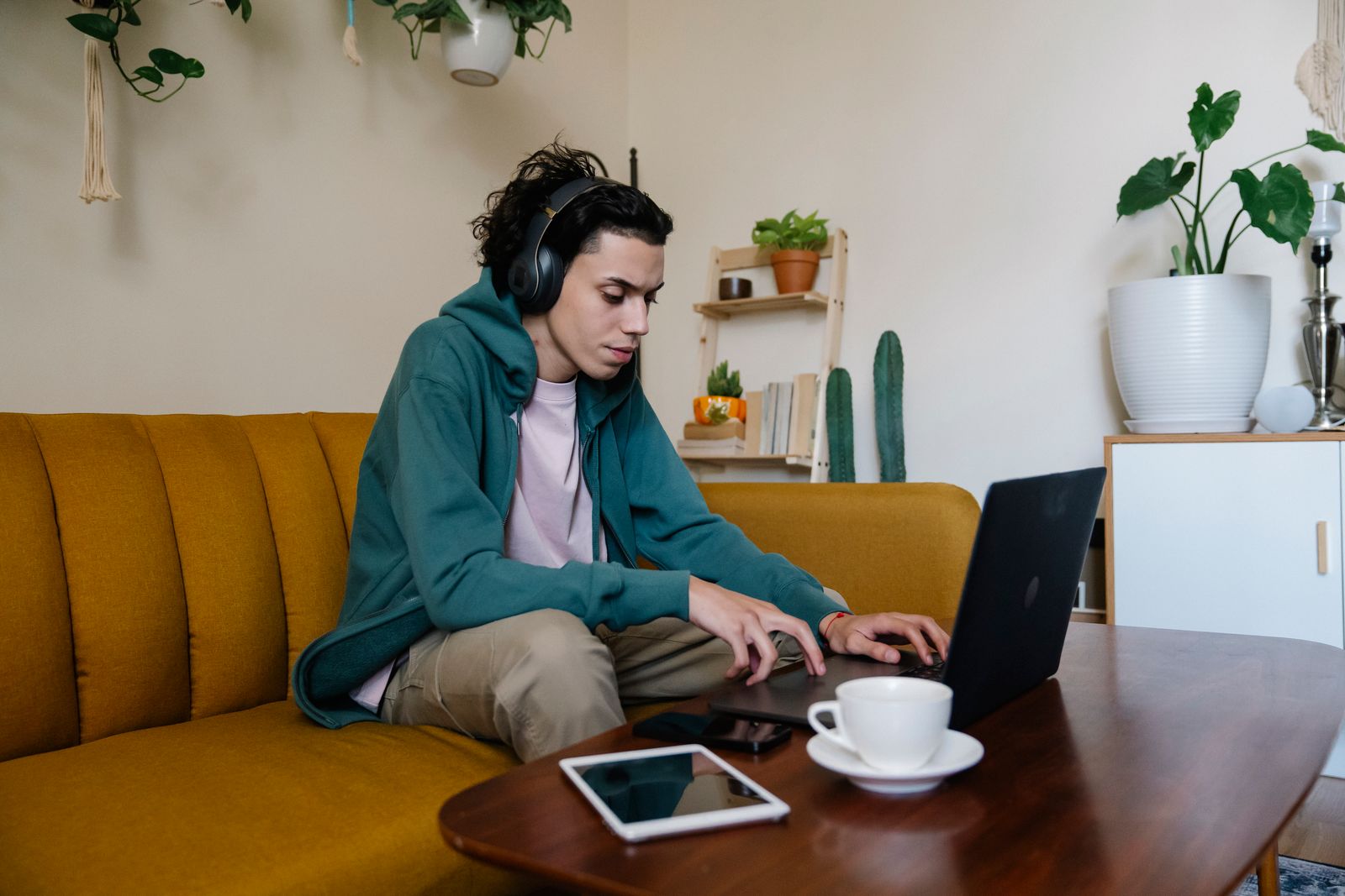 Writer typing a newsletter on a laptop
